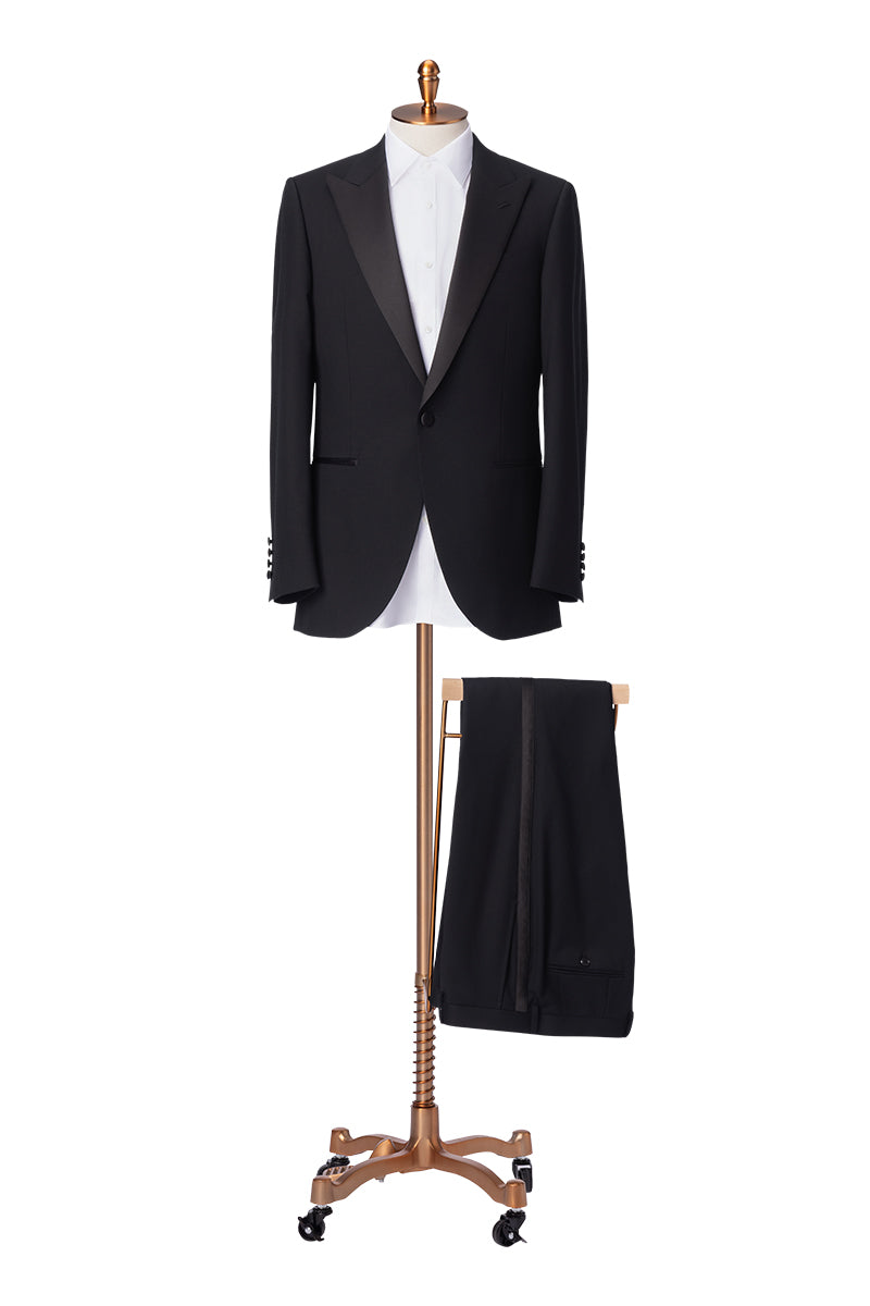 Black peak lapel tuxedo suitable for a respectful, formal look