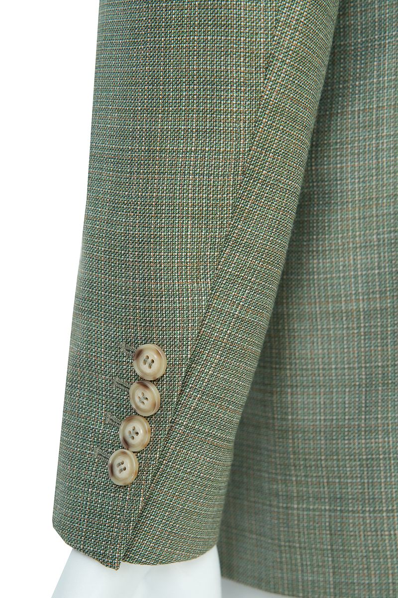 Cuff and button detail of the Marco Sage Green Mandarin Collar Jacket, a made-to-order men's sport coat in Super 130s Italian REDA wool, tailored to your measurements and shipped nationwide by Zane.