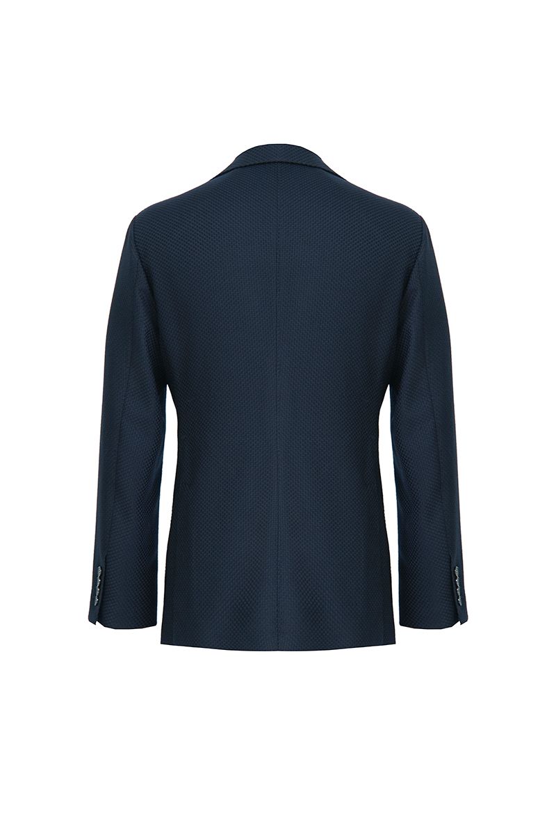 Styled look of the Luca Navy Double Breasted Sport Coat in Italian REDA wool, a made-to-order men's navy jacket for business, weddings, and evening events, shipped nationwide by Zane.