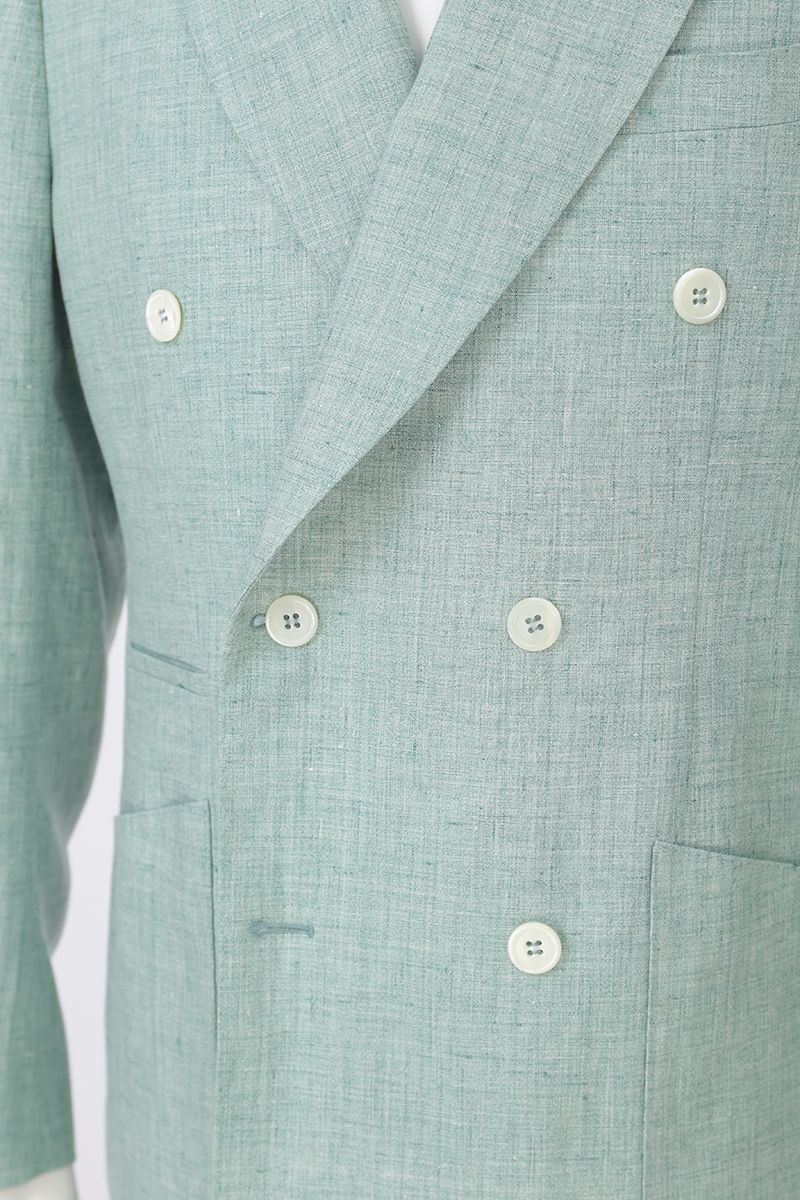Fabric and tailoring close-up of the Nico Sage Green Linen Sport Coat, showing the natural texture of 100% Italian Guabello linen, made to order and shipped nationwide by Zane.