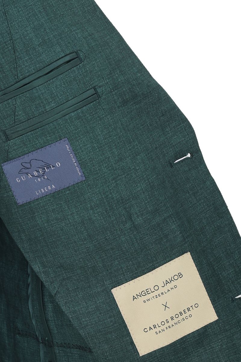 Shoulder and sleeve detail of the Fabio Pine Green Linen Sport Coat in 100% Italian Guabello linen, a made-to-order men's jacket tailored to your measurements and shipped nationwide by Zane.