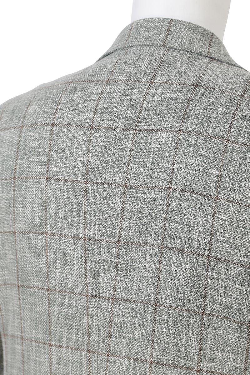 Chest and lapel detail of the Dante Light Grey Windowpane Sport Coat, a made-to-order men's notch lapel jacket in an Italian Guabello blend, shipped nationwide by Zane.