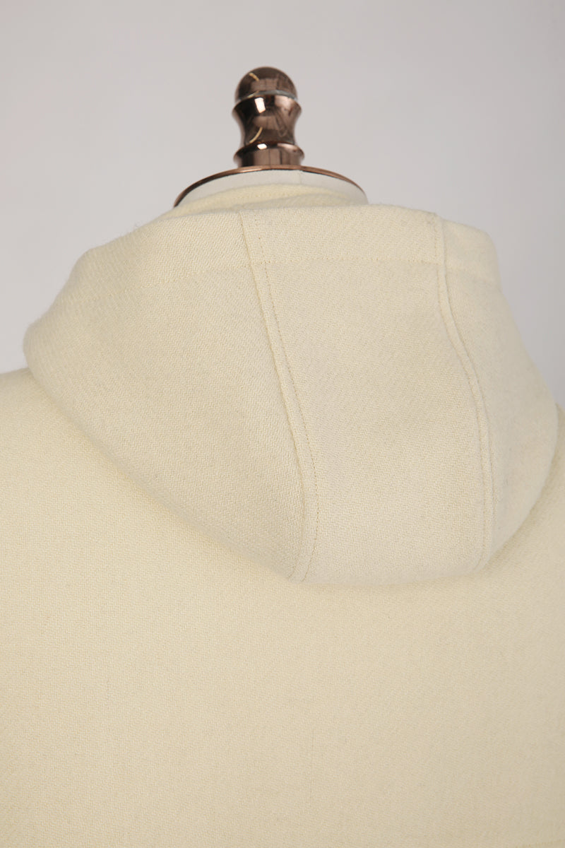 Beige dress form with a plain background