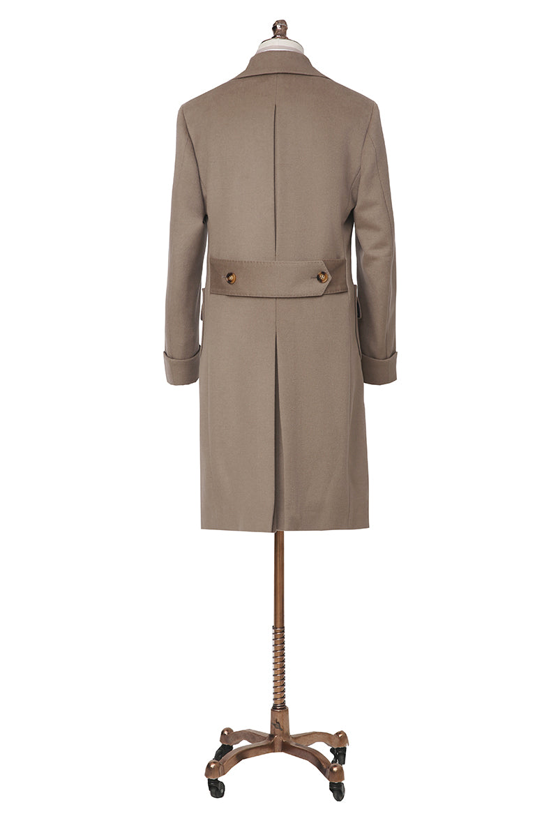 Beige trench coat on a mannequin against a white background
