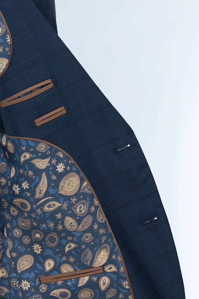Close-up of a navy blue suit jacket with a patterned lining
a light gray tailored suits for wedding jacksonville fl