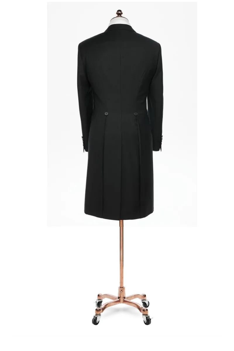 Black coat on a mannequin with a white background