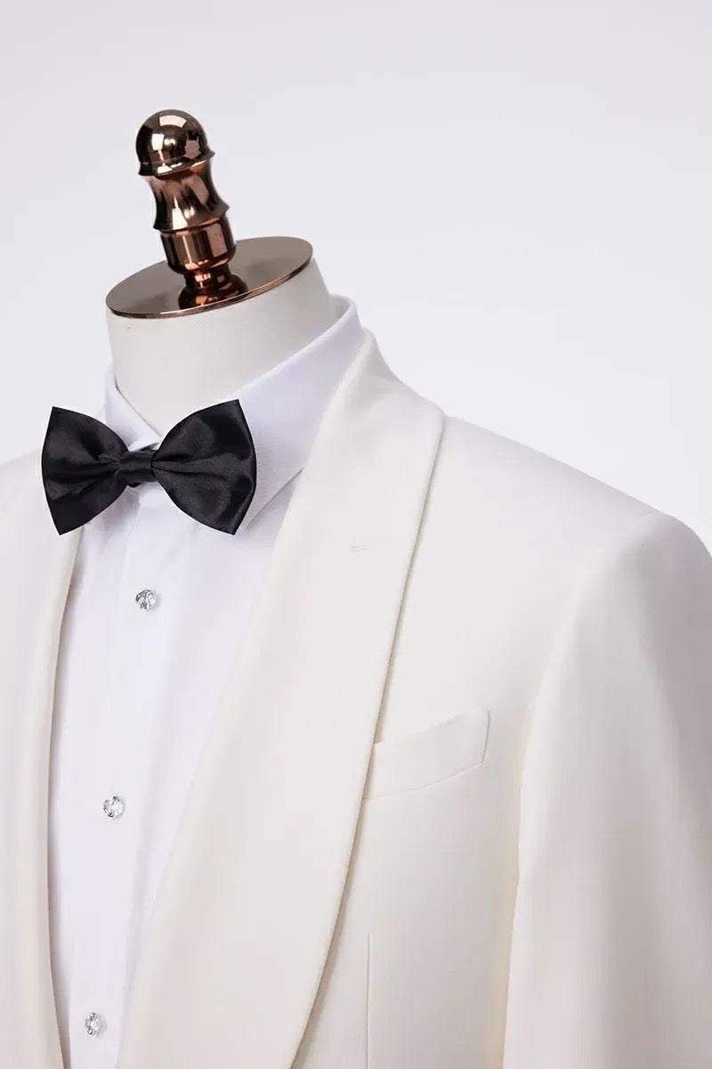 White shawl lapel tuxedo jacket with black bow tie custom made in Jacksonville Florida for weddings and formal events#customtuxedo #whitetuxedo #jacksonvilleflorida #menswear #zanesuits