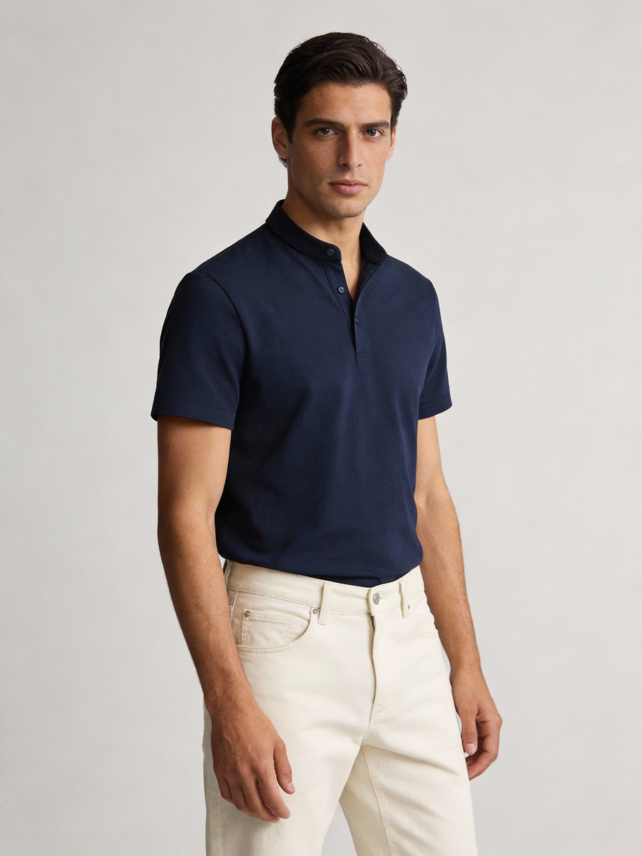 Man wearing navy cotton made to order short sleeve band collar polo, shipped nationwide by Zane