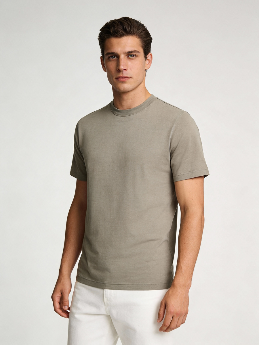 Man wearing taupe 100% wool made to order crew neck tee, shipped nationwide by Zane