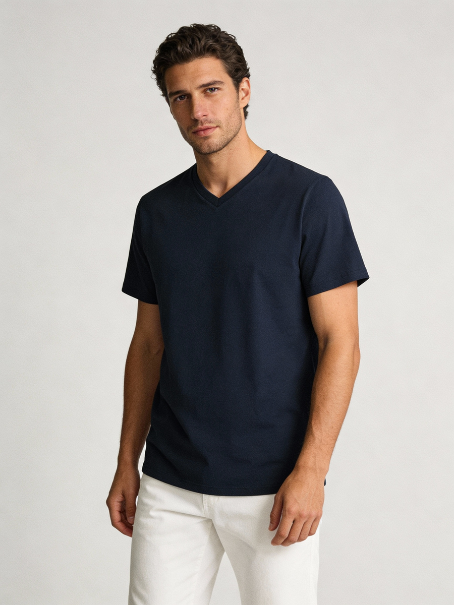 Man wearing navy 100% wool made to order V neck tee, shipped nationwide by Zane