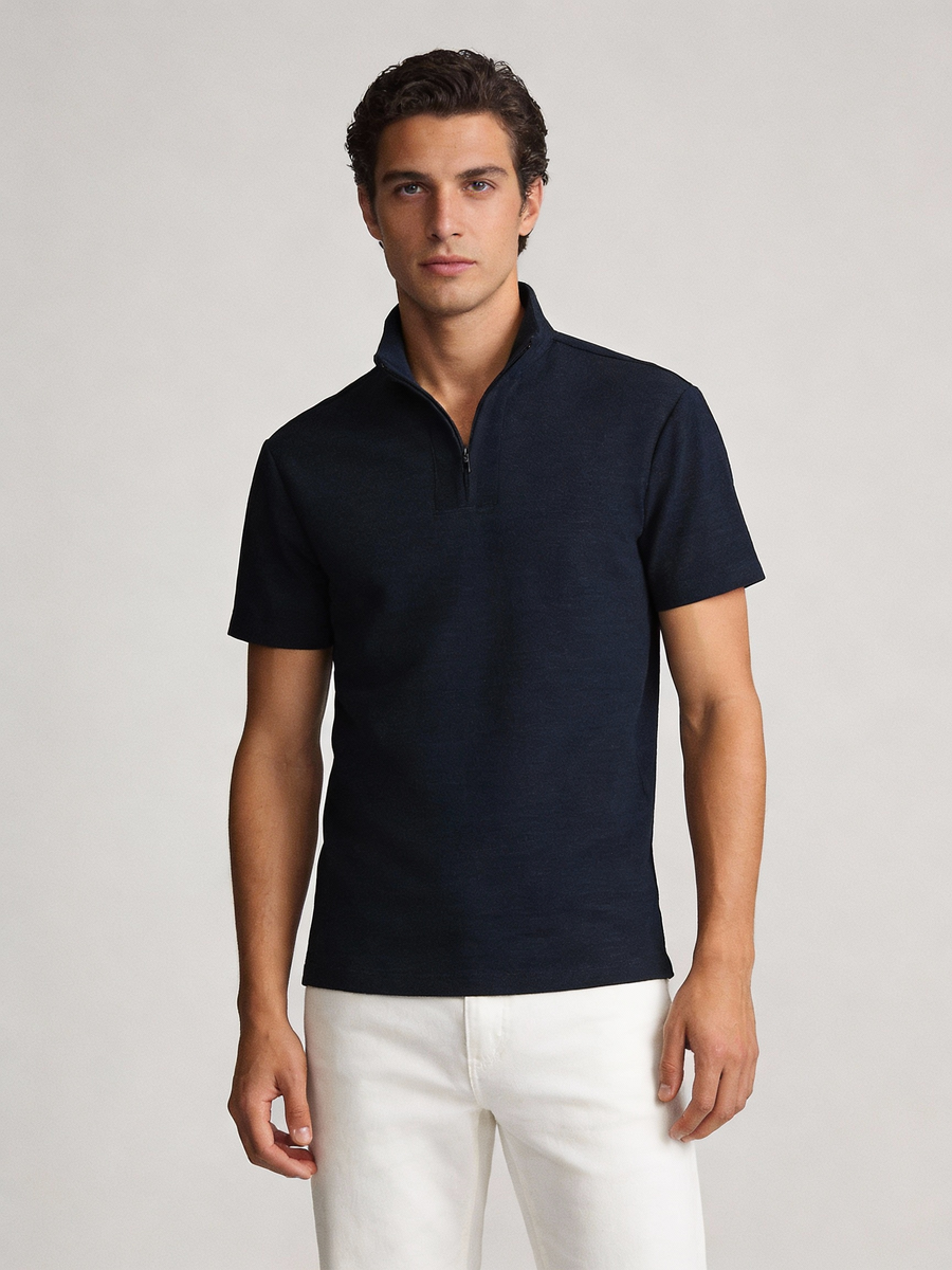Man wearing navy wool blend made to order short sleeve zip polo with stand collar, shipped nationwide by Zane