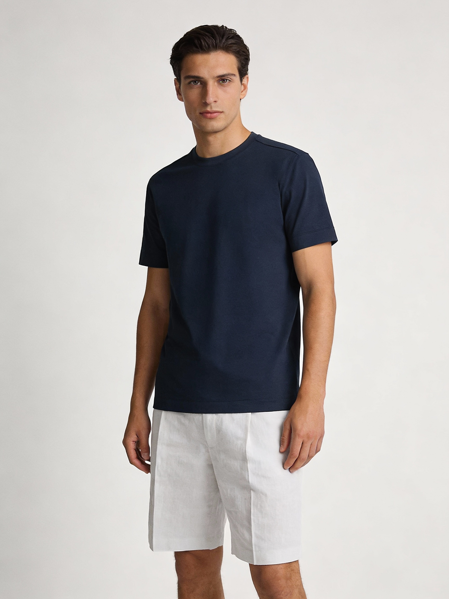 Man wearing navy 100% cotton made to order crew neck tee, shipped nationwide by Zane
