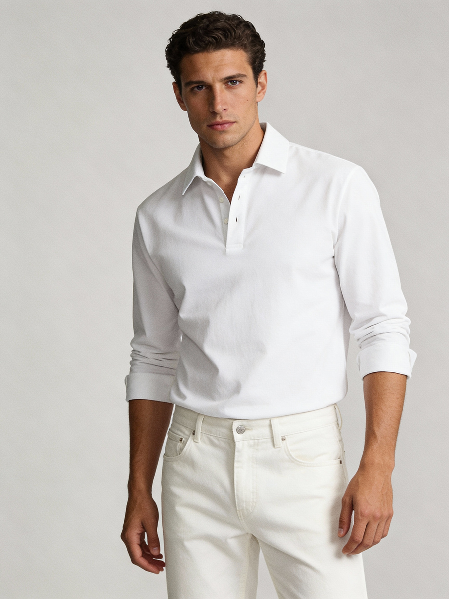 Man wearing white cotton made to order long sleeve polo with spread collar, shipped nationwide by Zane