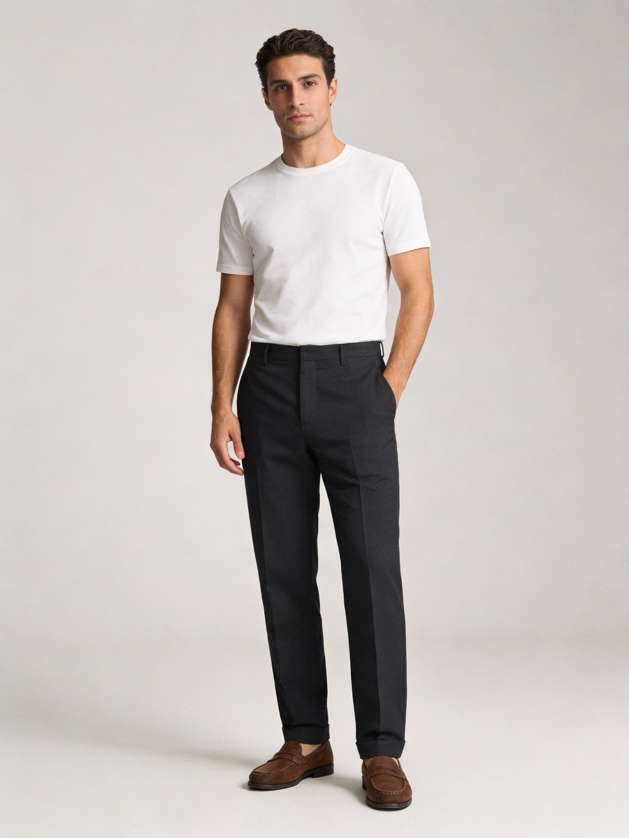 Man wearing white Pima cotton stretch made to order crew neck tee, shipped nationwide by Zane
