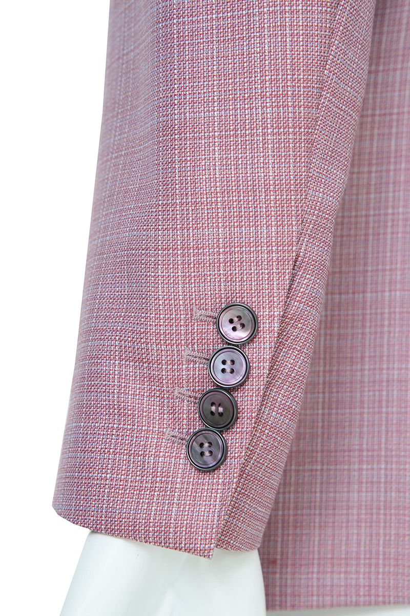 Side profile view of the Enzo Dusty Pink Sport Coat in dusty pink Super 130s Italian REDA wool, a made-to-order men's jacket shipped nationwide by Zane.