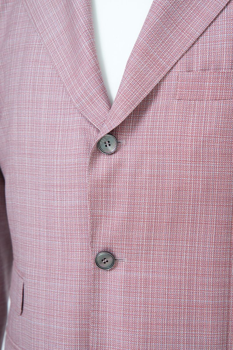 Fabric and tailoring close-up of the Enzo Dusty Pink Sport Coat, showing the premium Super 130s Italian REDA wool with a subtle plaid, made to order and shipped nationwide by Zane.