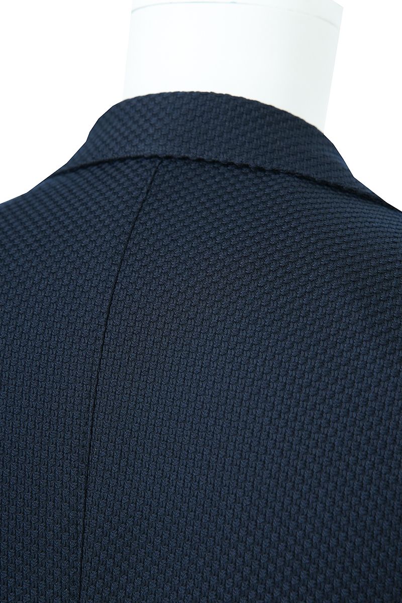 Side profile view of the Luca Navy Double Breasted Sport Coat in navy Italian REDA wool, a made-to-order men's jacket shipped nationwide by Zane.