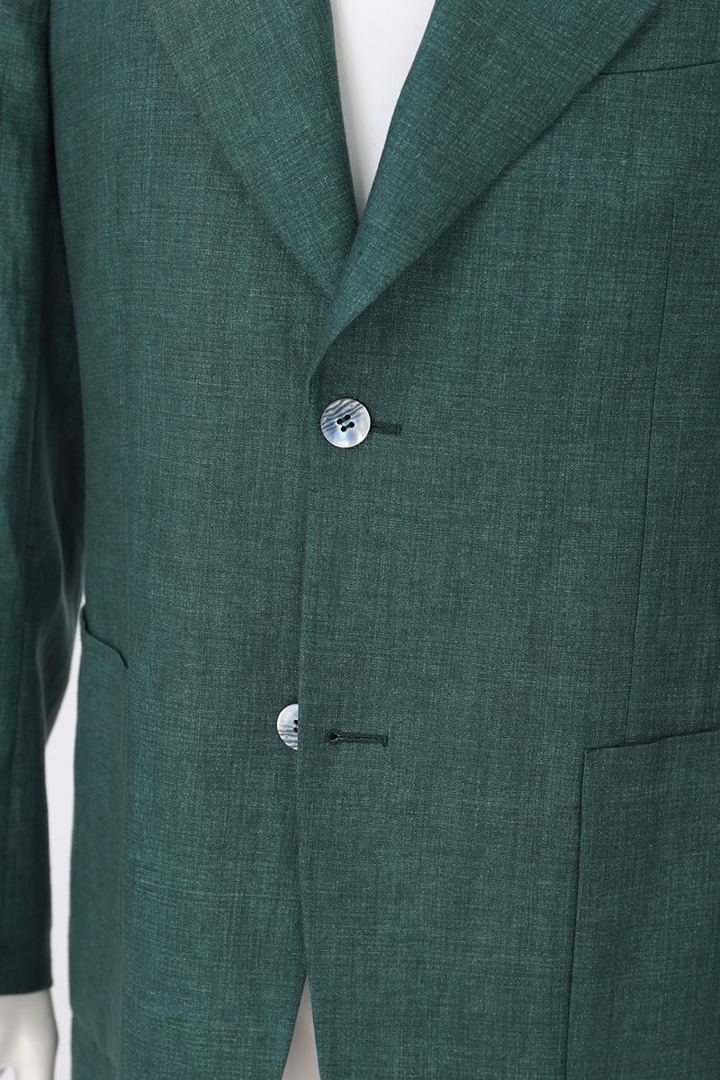 Fabric and tailoring close-up of the Fabio Pine Green Linen Sport Coat, showing the natural texture of 100% Italian Guabello linen, made to order and shipped nationwide by Zane.