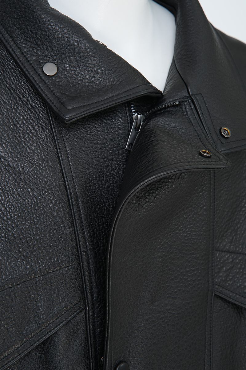 Black grained leather bomber jacket leather grain close up