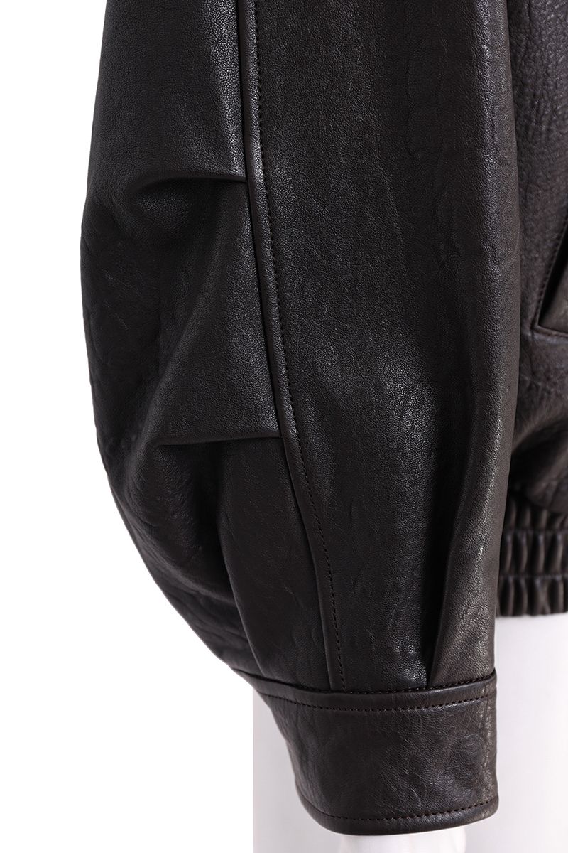 Brown leather moto jacket side view