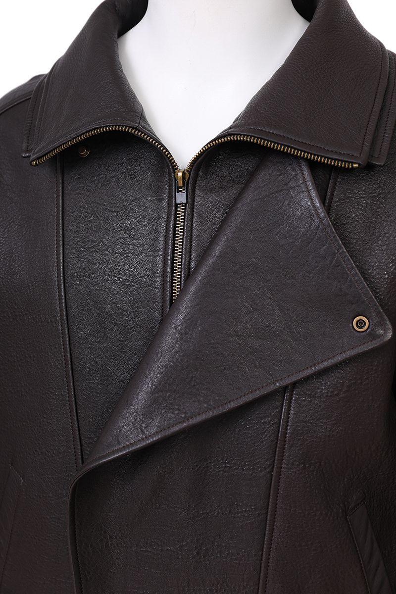 Brown leather moto jacket leather grain close up