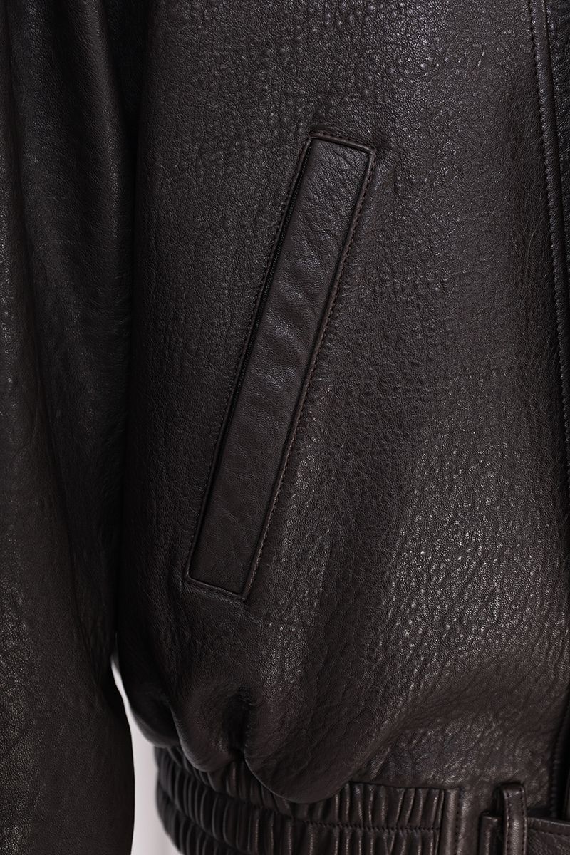 Brown leather moto jacket collar worn open