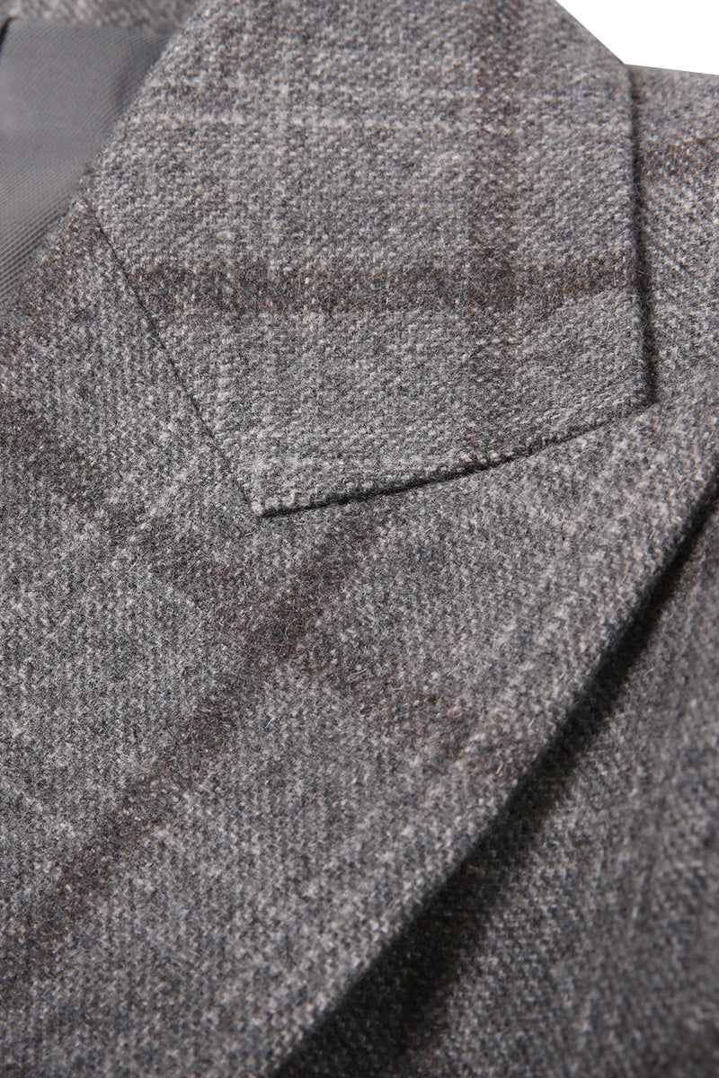 Close-up of a textured gray fabric with a checkered pattern. women business formalwear