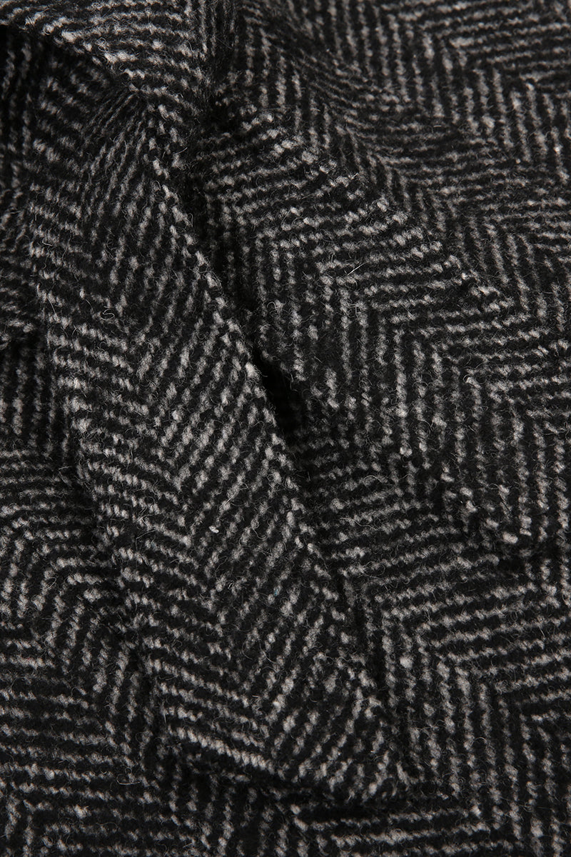 Close-up of black and gray herringbone pattern fabric
