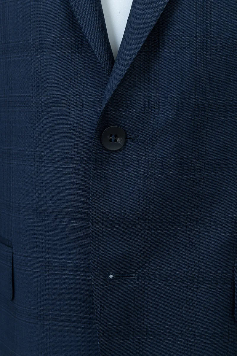 Close-up of a navy blue suit jacket with a button best suit style for office and travel 