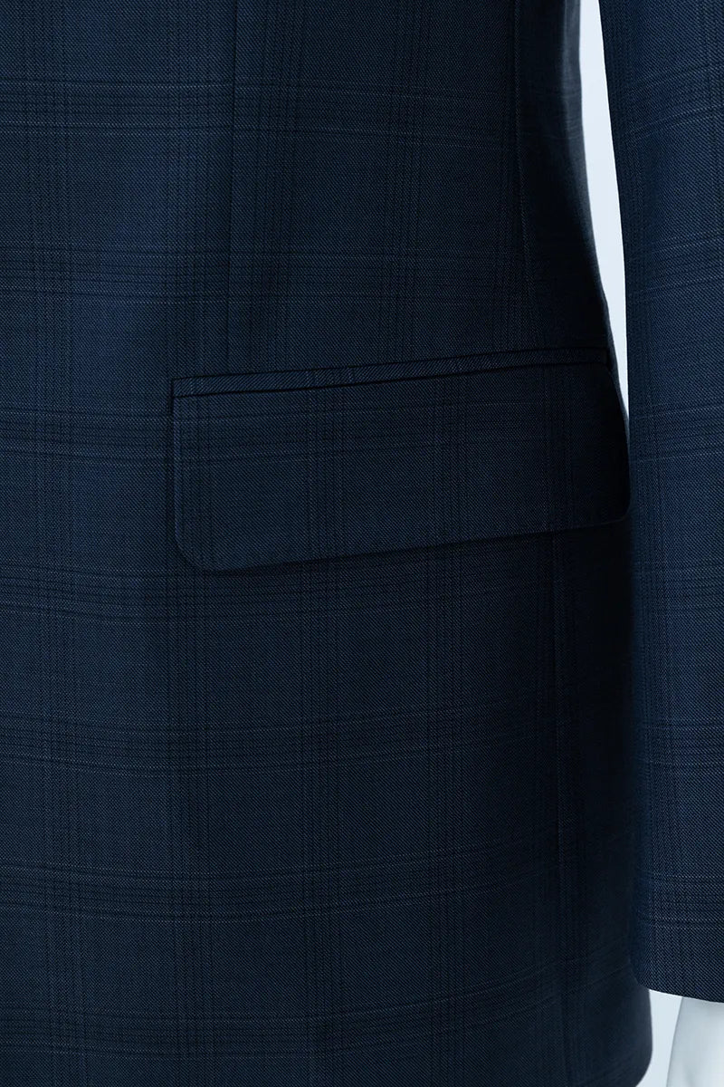 Close-up of a dark blue suit jacket with a pocket classic mens suits for business and travel