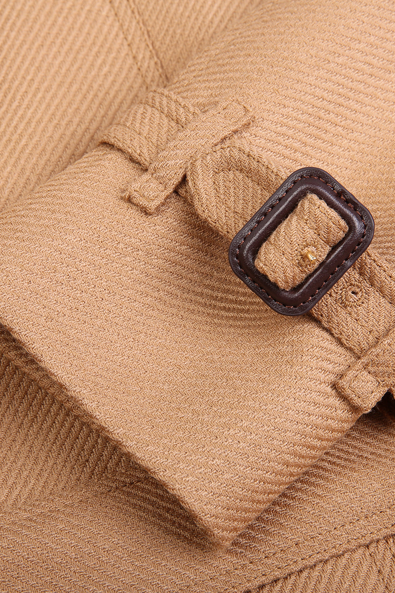 Close-up of a brown coat with a buckle detail custom suits and overcoats new york nyc Houston 