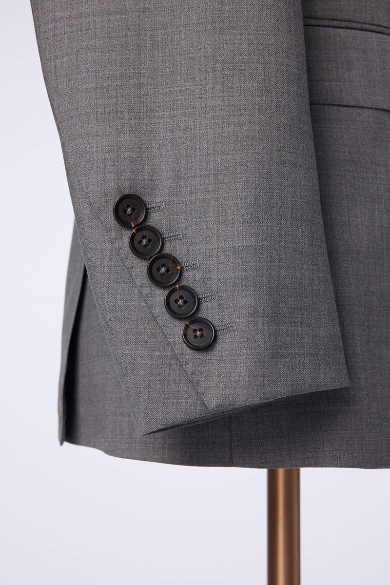 Elegant men's light gray blazer crafted from 100% wool, featuring a distinctive shawl lapel design, single-button front closure, structured shoulders, and tailored fit for formal occasions. Displayed on a mannequin stand, this sophisticated blazer is ideal for business professionals, weddings, evening events, and upscale gatherings. Perfectly pairs with dress pants, formal shirts, and accessories for a complete polished look, showcasing luxury men's formalwear and timeless fashion style.