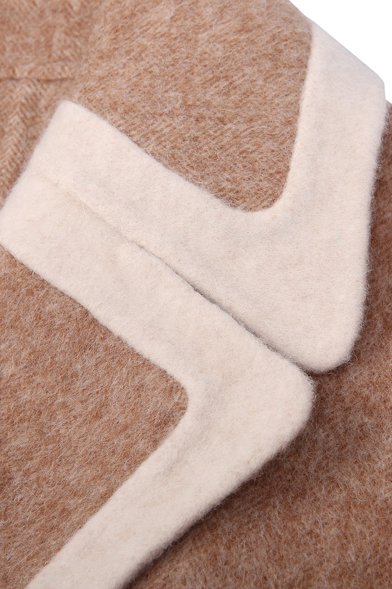 Close-up of a brown and beige fabric with a chevron pattern
