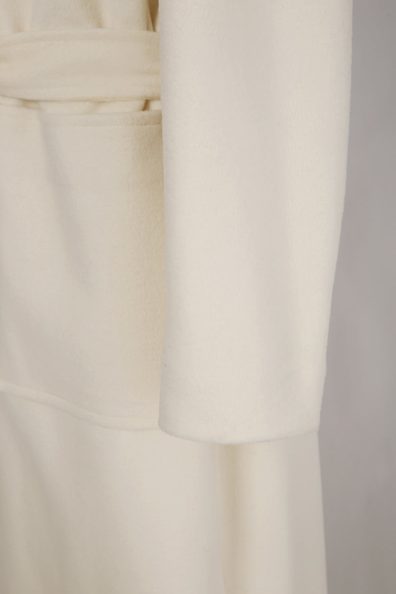 Close-up of a white fabric texture with a gradient background